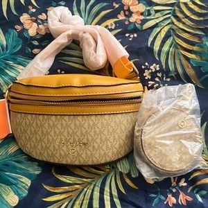 BNWT - muted yellow 2 piece Michael Kors belt bag.